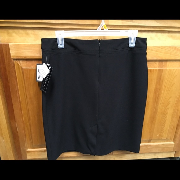 Black, lined, back zip skirt. Never worn. - Picture 2 of 5